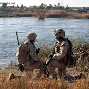 Patrol down a riverbed in Barwana, Iraq