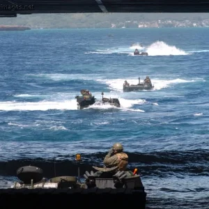 AAV's return to the dock transport ship USS Rushmore