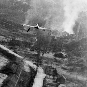 A U.S. Air Force Lockheed F-80C Shooting Star drops napalm bombs in Korea, May 1952. Note what...jpg