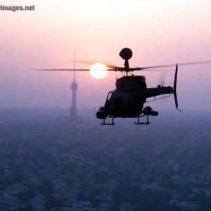 OH-58D in the rising sun of Baghdad