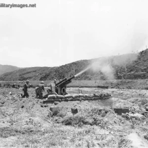 Korean War, A 105-mm howitzer in action