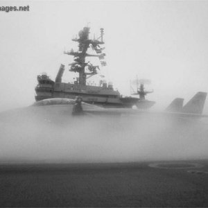 F-14 prepares for Cat launch on a foggy morning