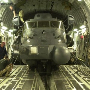 Airmen offload a MH-53J Pave Low III helicopter