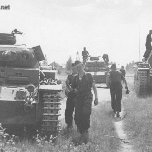 Three Pz.Kpfw III tanks