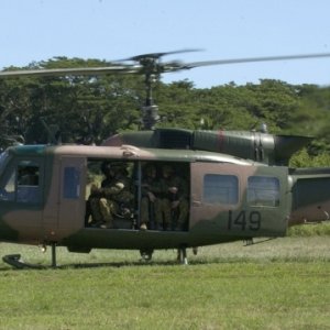 Australian Army Iroquois helicopter takes off