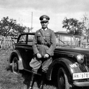 German officer & Opel Olympia car