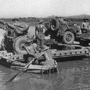 Jeep & 25 pounder artillery crossing river