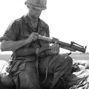 Vietnam Infantryman Loading M79 Grenade Launcher