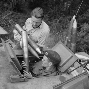 Canadians loading a tank with Ammo