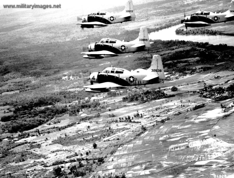 A-1E Skyraider aircraft fly in formation
