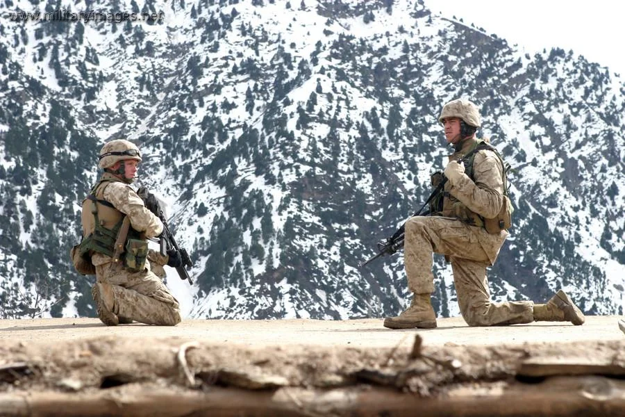 Cpl's provide security on a rooftop