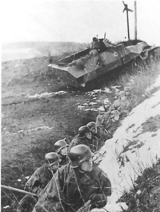 German soldiers with a SdKfz 251/1 (March, 1945)