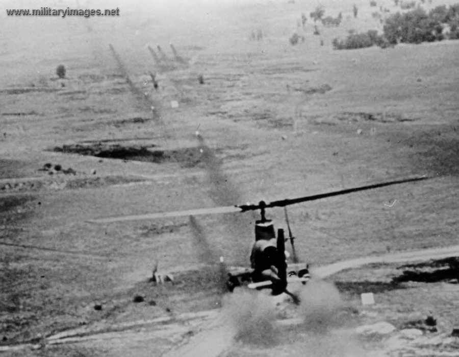 Huey Cobra Firing in Support of a Combat Assault