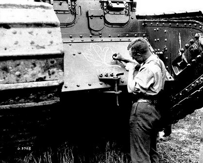 Painting_a_Maple_leaf_on_a_British_Great_War_Tank-21