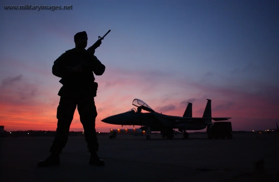 Staff Sgt. guards an F-15 Eagle