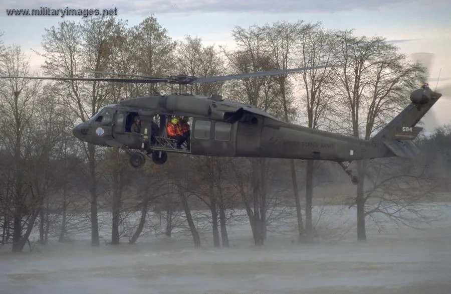 UH-60L Black Hawk hovers over California floodwaters